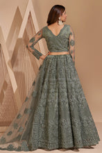 Load image into Gallery viewer, Sage Green Crystal Heavy Designer Work Soft Net Wedding Lehenga Choli