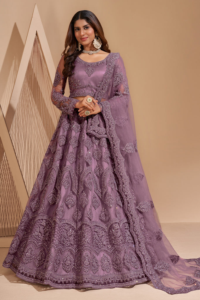 Mauve Crystal Heavy Designer Work Soft Net Wedding Lehenga Choli