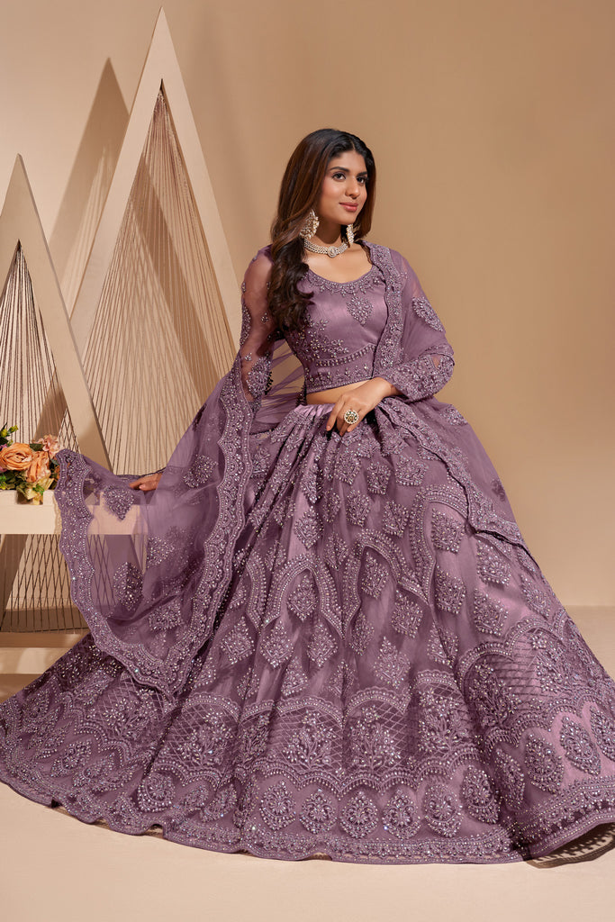 Mauve Crystal Heavy Designer Work Soft Net Wedding Lehenga Choli