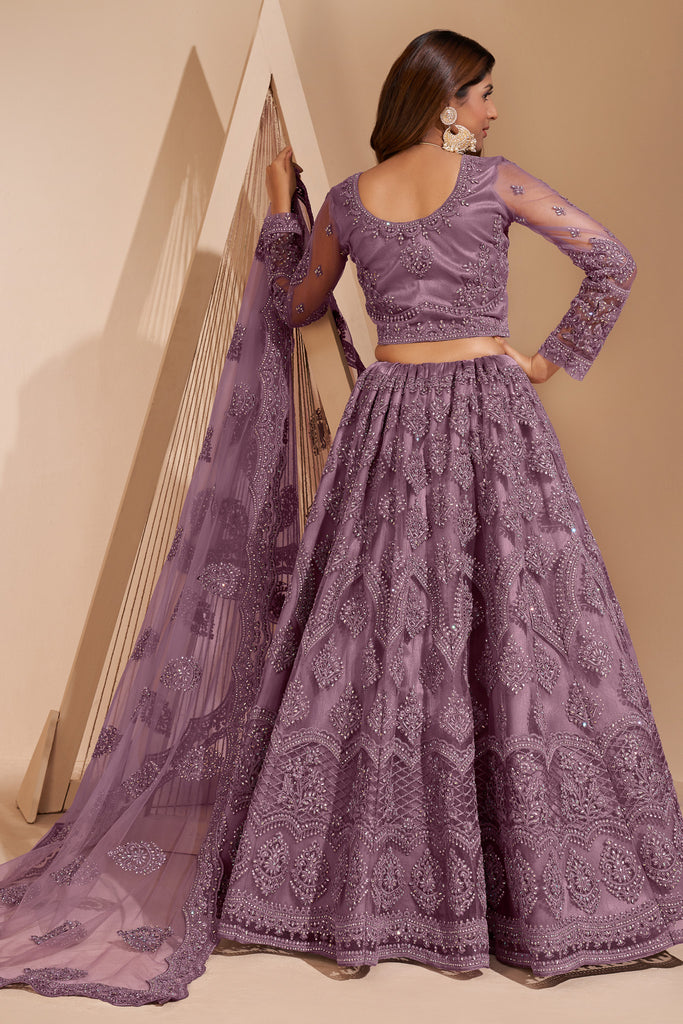 Mauve Crystal Heavy Designer Work Soft Net Wedding Lehenga Choli