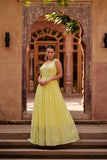 Party Wear Bright Yellow Georgette Gown With Net Dupatta