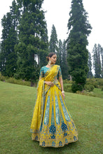 Load image into Gallery viewer, Empire Yellow And Blue Bridal Designer Banarasi Silk Lehenga Choli With Cording, Thread, Stone And Sequins Work