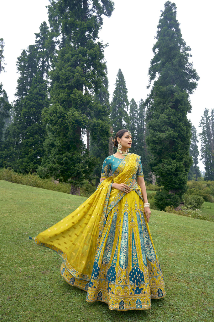 Empire Yellow And Blue Bridal Designer Banarasi Silk Lehenga Choli With Cording, Thread, Stone And Sequins Work